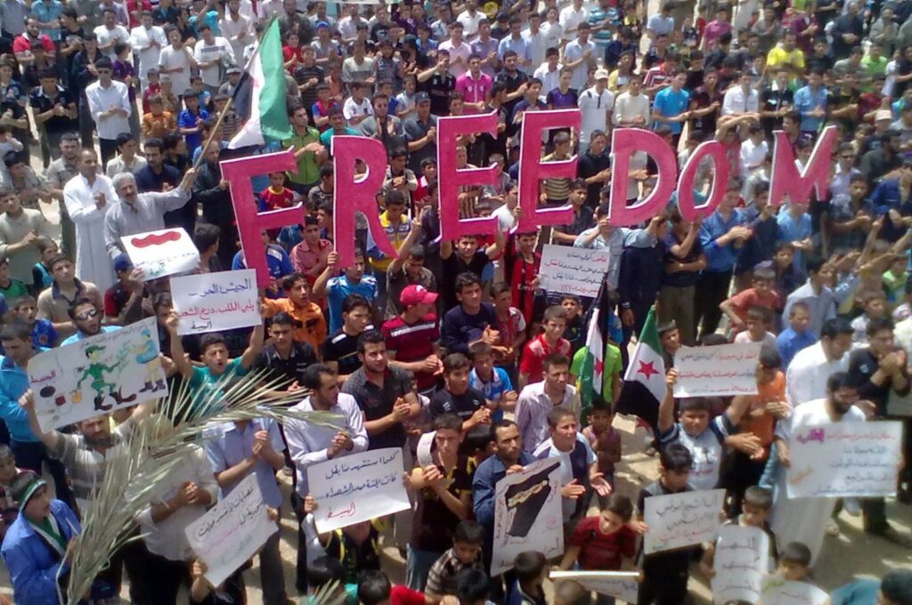 An image released by the Syrian opposition's Shaam News Network shows an anti-regime demonstration in the town of Habit in Idlib province, Syria, May 11, 2012. (AFP Photo)