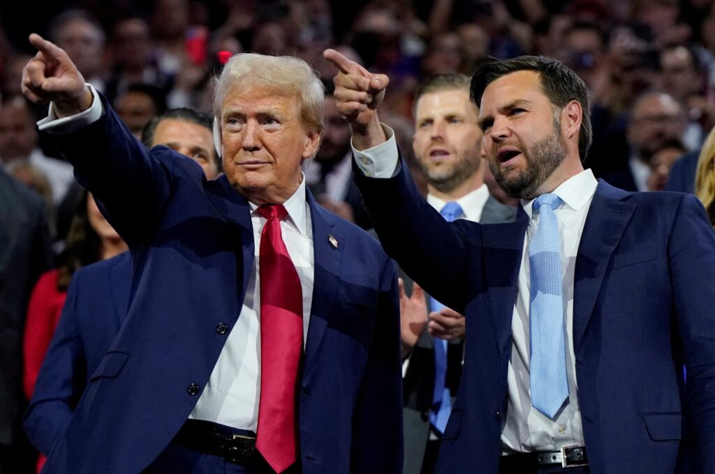 Republican presidential nominee and former U.S. President Donald Trump and Republican vice presidential nominee J.D. Vance point to the stage during Day 1 of the Republican National Convention (RNC), at the Fiserv Forum in Milwaukee, Wisconsin, U.S., July 15, 2024. (Reuters Photo)