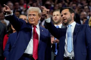 Republican presidential nominee and former U.S. President Donald Trump and Republican vice presidential nominee J.D. Vance point to the stage during Day 1 of the Republican National Convention (RNC), at the Fiserv Forum in Milwaukee, Wisconsin, U.S., July 15, 2024. (Reuters Photo)