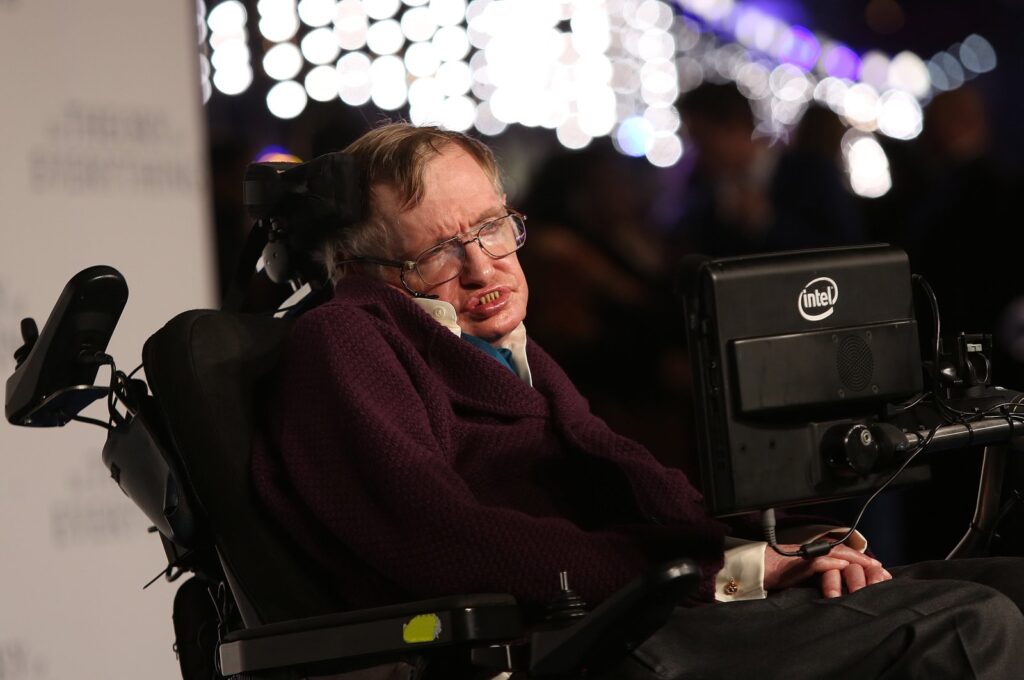 Professor Stephen Hawking arrives on the blue carpet for the U.K. premiere of "The Theory Of Everything" at the Odeon in Leicester Square, central London, Dec. 9, 2014. (AP Photo)