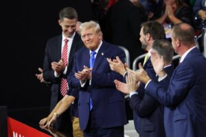 Republican presidential nominee and former U.S. President Donald Trump and Republican vice presidential nominee J.D. Vance applaud on Day 2 of the Republican National Convention (RNC), at the Fiserv Forum, Milwaukee, Wisconsin, U.S., July 16, 2024. (Reuters Photo)