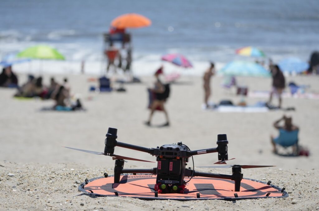 A drone with emergency flotation devices attached prepares to launch at Rockaway Beach, New York, U.S., July 11, 2024. (AP Photo)