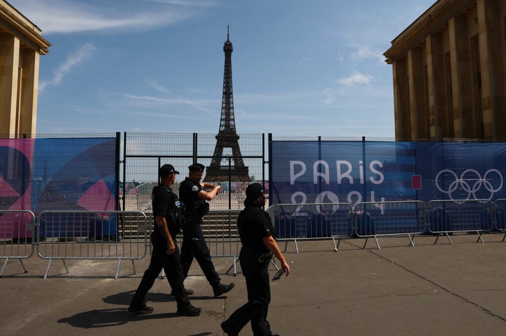 Police walk past the Eiffel Tower ahead of Paris 2024, Paris, France, July 18, 2024. (Reuters Photo)