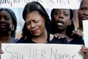Donna Massey mourns the loss of her daughter, Sonya, who was shot and killed by Sangamon County Sheriff's Deputies July 6, during a protest over her daughter's death in front of the Sangamon County Building in Springfield, Illinois, U.S., July 12, 2024.  (Thomas J. Turney/The State Journal-Register/USA Today Network via Reuters)