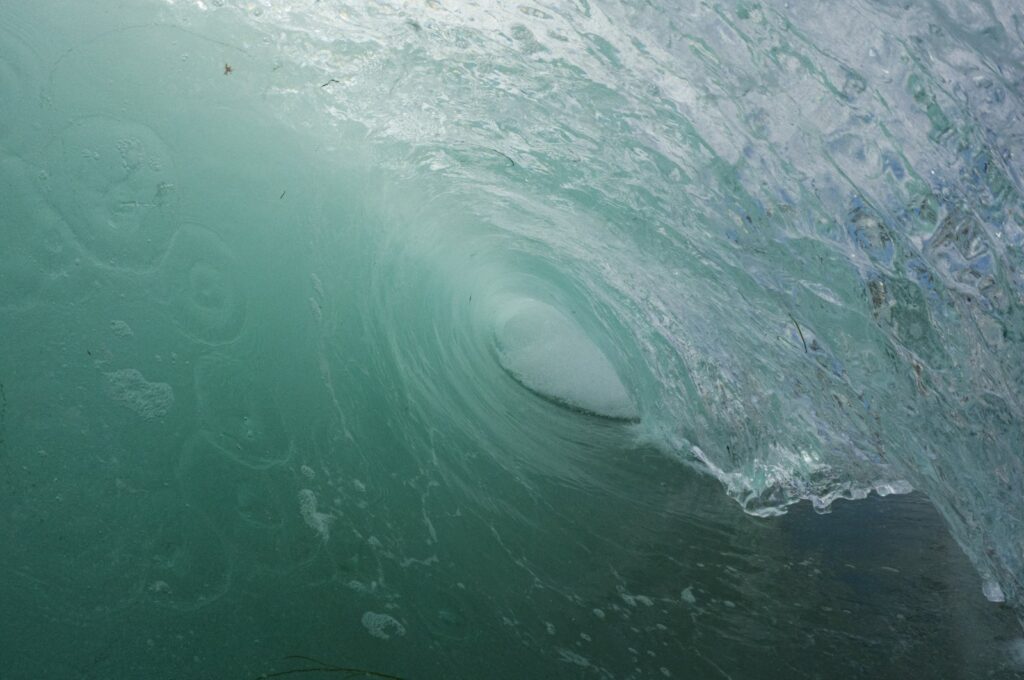 A wave in the Pacific Ocean breaks along the shore of La Jolla's Windansea Beach on a crowded summer day, in San Diego, California, U.S., July 2, 2023. (Getty Images Photo)