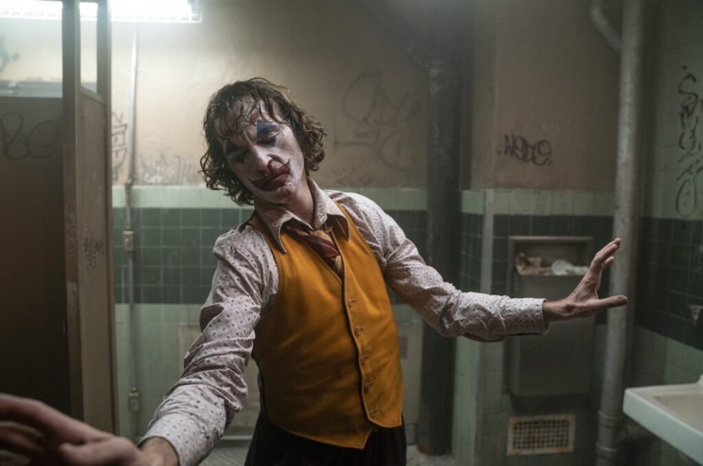 This image released by Warner Bros. Pictures shows Joaquin Phoenix in a scene from "Joker." (AP Photo)
