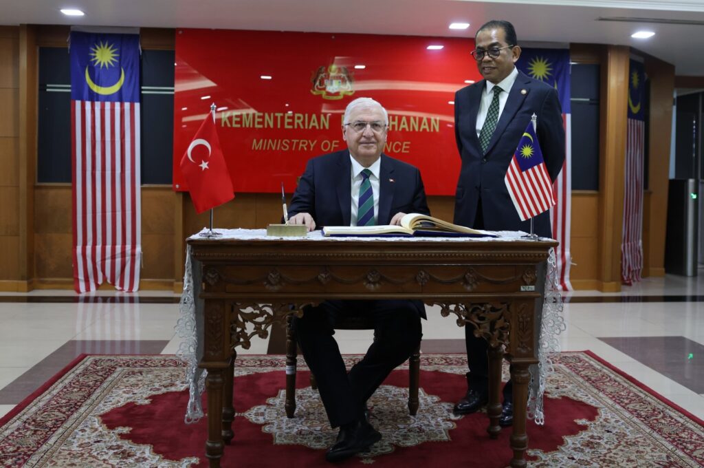 Türkiye's Minister of National Defence Yaşar Güler meets with his Maleysian counterpart Seri Mohamed Khaled Nordin. Güler signed the book of honor at the Ministry of Defense of Malaysia, Kuala Lumpur, Malaysia, Aug. 20. 2024. (AA Photo)
