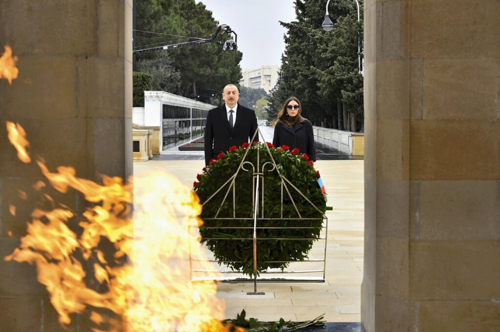 Azerbaijani President Ilham Aliyev and Azerbaijan's First Lady and Vice President Mehriban Aliyeva attend a laying ceremony at the Honorary Alley and the Alley of Martyrs in Baku, Azerbaijan, Dec. 4, 2020. (AP Photo)