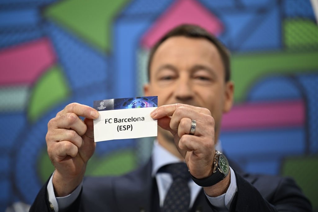 Special guest John Terry draws out the card of FC Barcelona during the UEFA Champions League 2023/24 Round of 16 Draw at the UEFA headquarters, the House of European Football, Nyon, Switzerland, Dec. 18, 2023. (Getty Images Photo)