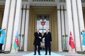 President Recep Tayyip Erdoğan shakes hands with Azerbaijani President Ilham Aliyev (L) at the Presidential Complex, Ankara, Türkiye, Feb. 19, 2024. (AA File Photo)