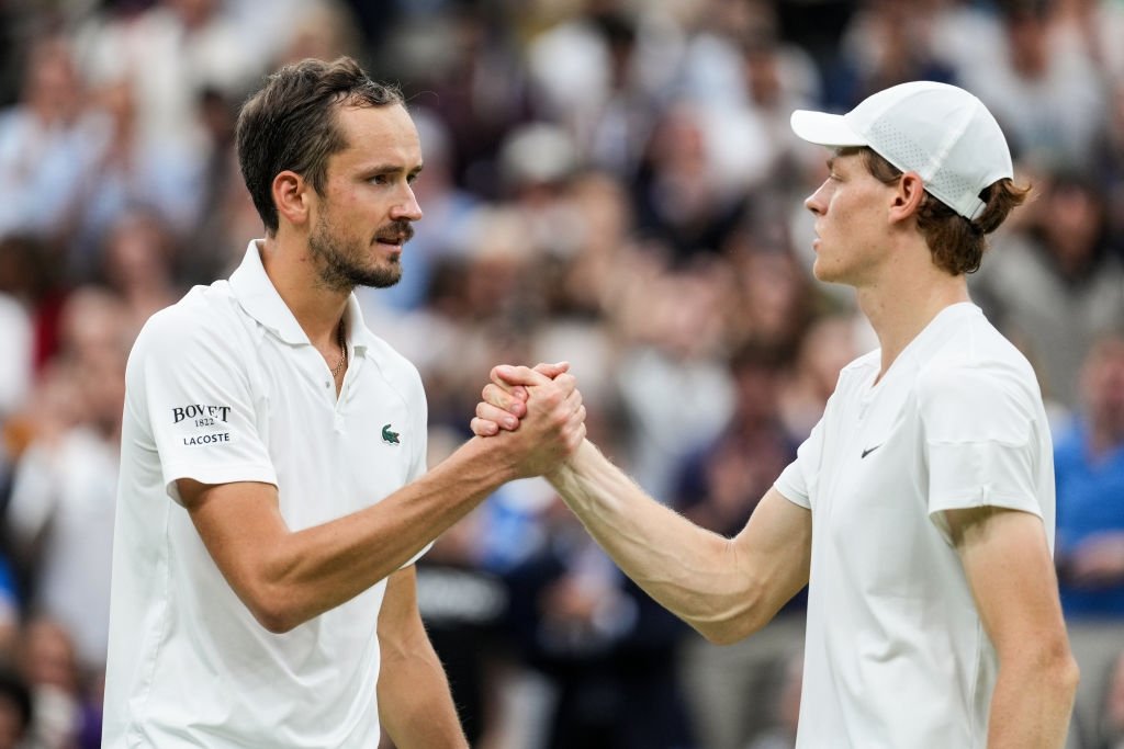 Daniil Medvedev (L) greets Jannik Sinner of Italy after their Men's Singles quarterfinals match during day nine of The Championships Wimbledon 2024 at All England Lawn Tennis and Croquet Club, London, U.K., July 9, 2024. (Getty Images Photo)