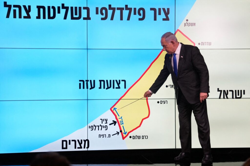 Israeli Prime Minister Benjamin Netanyahu stands in front of a map of the Gaza Strip, telling viewers that Israel must retain control over the "Philadelphi Corridor," a strategic area along the territory's border with Egypt, during a news conference in west Jerusalem, Israel, Sept. 2, 2024.(AFP Photo)
