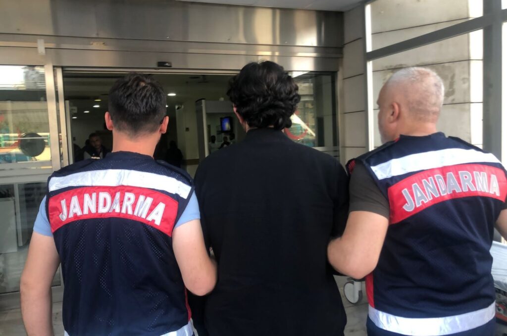 Gendarmerie forces escort a suspected terrorist to the courthouse in southeastern Şanlıurfa province, Türkiye, Oct. 31, 2023. (DHA Photo)