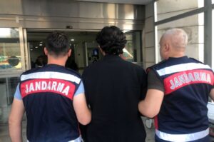 Gendarmerie forces escort a suspected terrorist to the courthouse in southeastern Şanlıurfa province, Türkiye, Oct. 31, 2023. (DHA Photo)