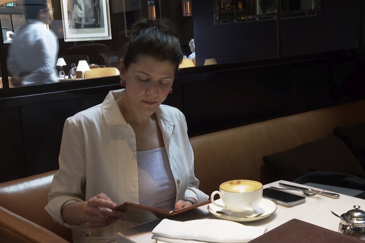 Parisa Imanirad, a scientist and cancer researcher, eats lunch alone at Spruce, an upscale restaurant in San Francisco, Aug. 22, 2024. (AP Photo)