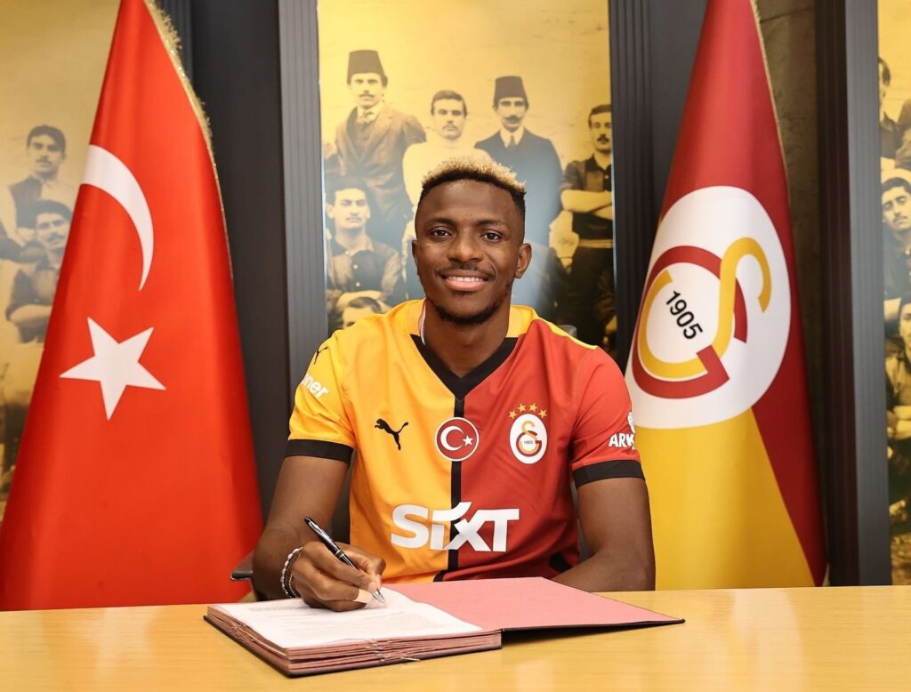 Galatasaray's new signing, Victor Osimhen, poses for a photo as he signs his contract, Istanbul, Türkiye, Sept. 5, 2024. (IHA Photo)