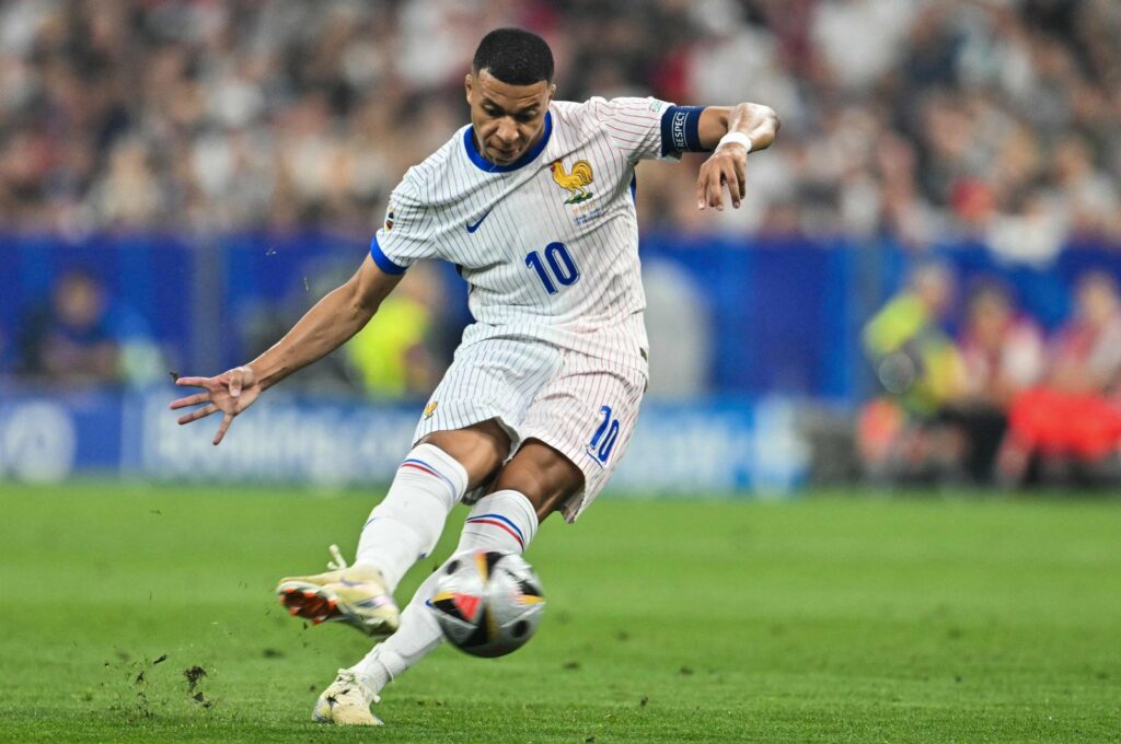 France's Kylian Mbappe attempts a shot during the UEFA Euro 2024 semifinal football match between Spain and France at the Munich Football Arena, Munich, Germany, July 9, 2024. (AFP Photo)