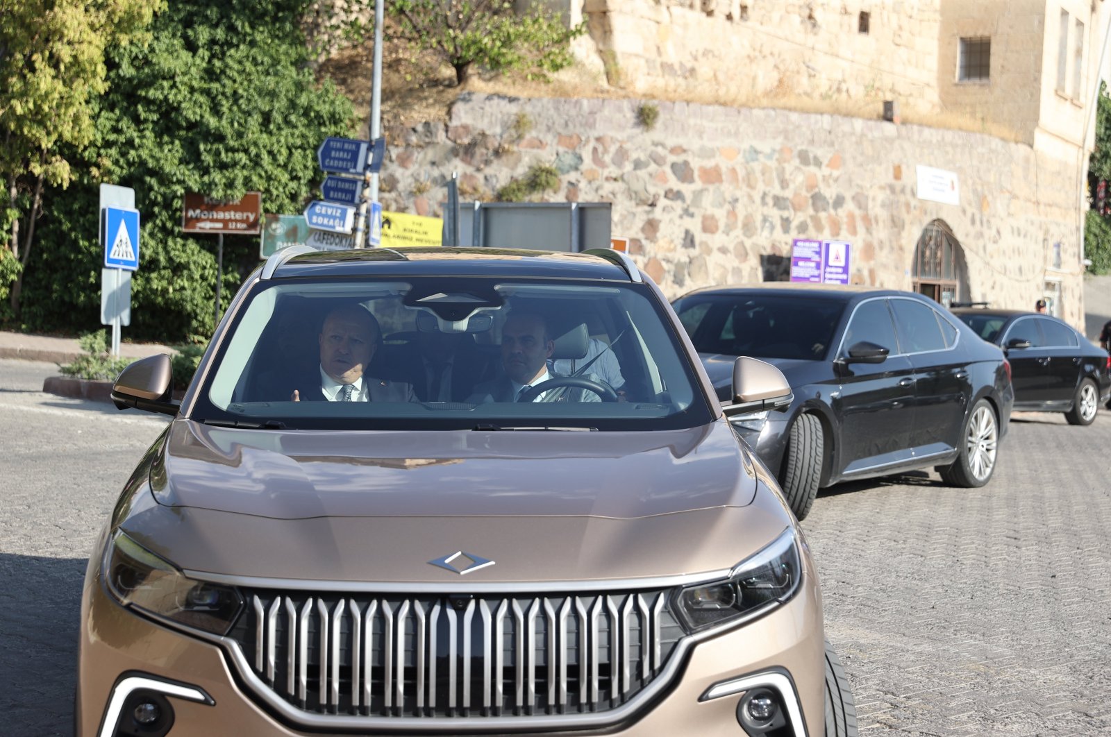 Industry and Technology Minister Mehmet Fatih Kacır is photographed driving the Togg T10X model during a visit to central Nevşehir province, Türkiye, Aug. 22, 2024. (AA Photo)