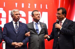 Ankara Mayor Mansur Yavaş (L) and Republican People's Party's (CHP) Chair Özgür Özel (C) listen as Istanbul Mayor Ekrem Imamoğlu (R) speaks at the CHP's charter convention, Ankara, Türkiye, Sept. 7, 2024. (AA Photo)