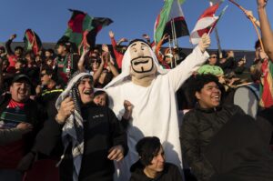 Club Palestino team fans celebrate their victory over Santiago Wanderers at a local league match at La Cisterna stadium, Santiago, Chile, July 12, 2024. (AP Photo)
