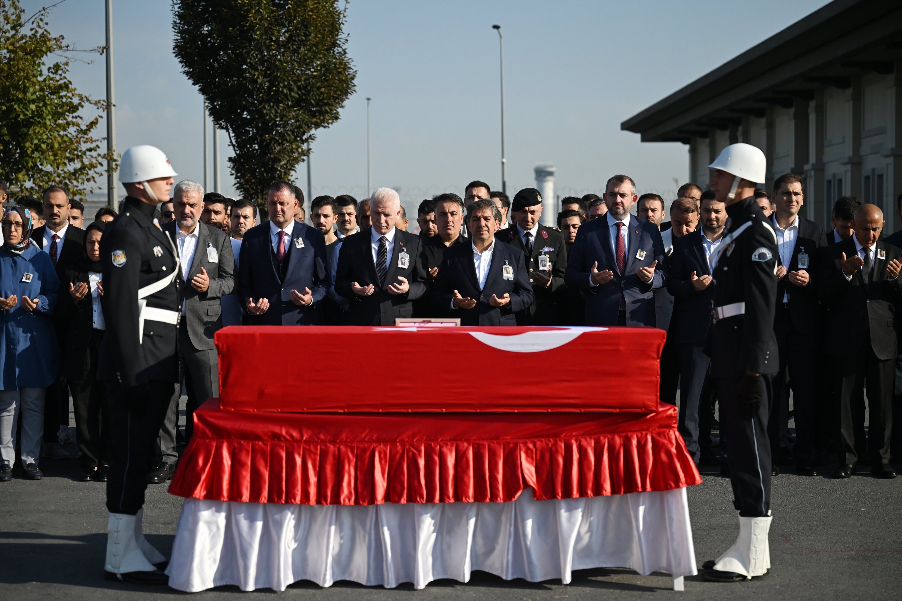 345782 Turkish officials and soldiers stand guard at a ceremony after the body of Turkish American activist Ayşenur Ezgi Eygi arrives in Istanbul, Türkiye, Sept. 13, 2024. (AA Photo)