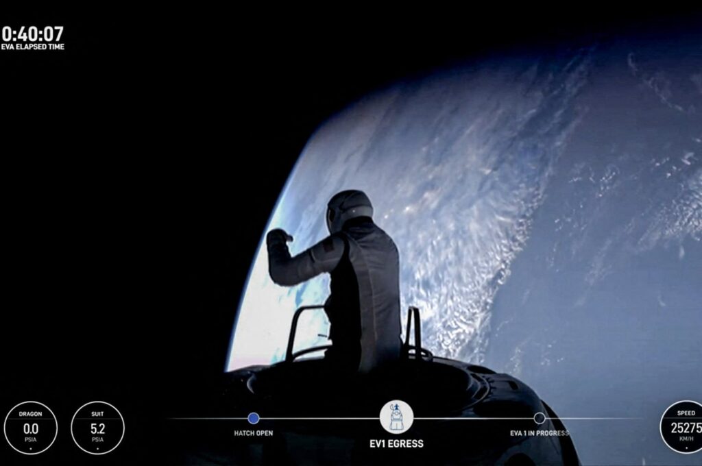 This still image taken from a SpaceX and Polaris broadcast shows U.S. fintech billionaire Jared Isaacman (EV1) peeking out to space from a hatch structure called "Skywalker" during the first private spacewalk performed by the crew of the SpaceX Polaris Dawn mission, Sept. 12, 2024. (AFP Photo)
