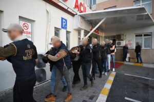 Suspects detained as part of an investigation into Mossad's activities in Türkiye escorted by police to undergo routine medical checks, Istanbul, Türkiye, Jan. 4, 2024. (AA Photo)
