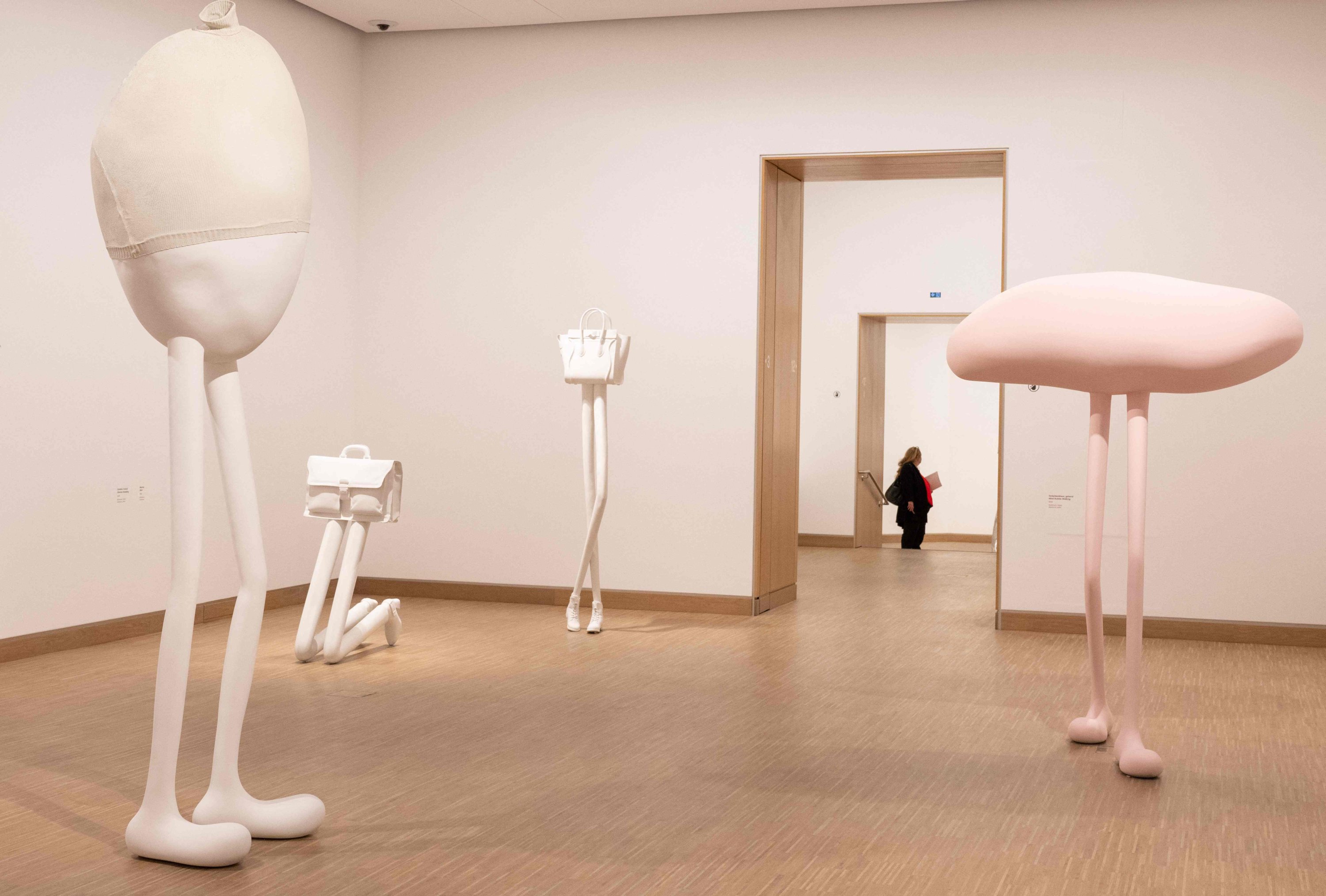346606 A visitor looks at creations of Austrian artist Erwin Wurm during the preview of Wurm's 70th-Birthday Retrospective at the Albertina Modern Museum, Vienna, Austria, Sept. 12, 2024. (AFP Photo)