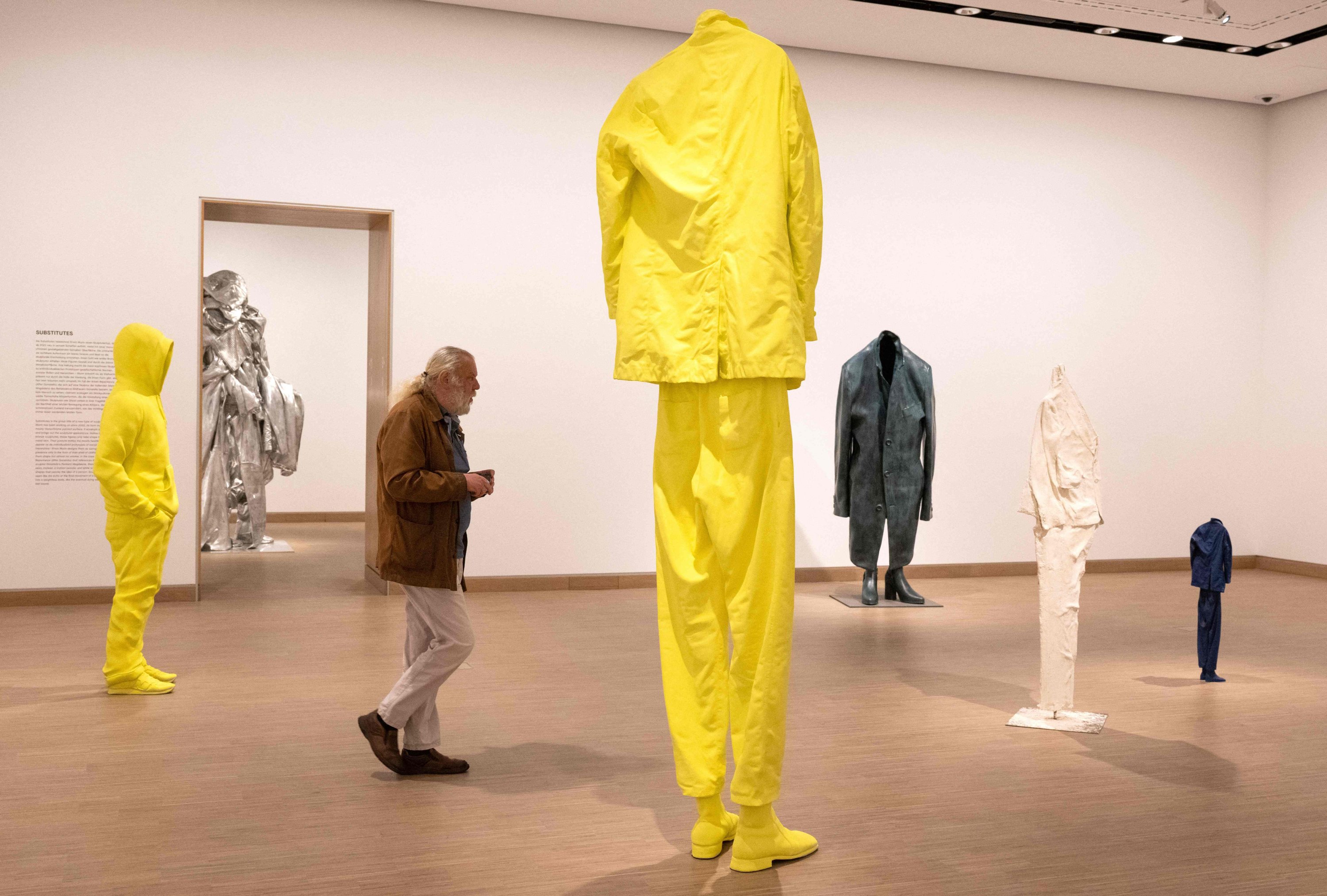 346609 A visitor looks at creations of Austrian artist Erwin Wurm during the preview of Wurm's 70th-Birthday Retrospective at the Albertina Modern Museum, Vienna, Austria, Sept. 12, 2024. (AFP Photo)