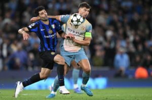 Inter Milan's Iranian forward Mehdi Taremi (L) vies with Manchester City's Portuguese defender Ruben Dias (R) during their UEFA Champions League match, in Manchester, U.K., Sept. 18, 2024 (AFP Photo)