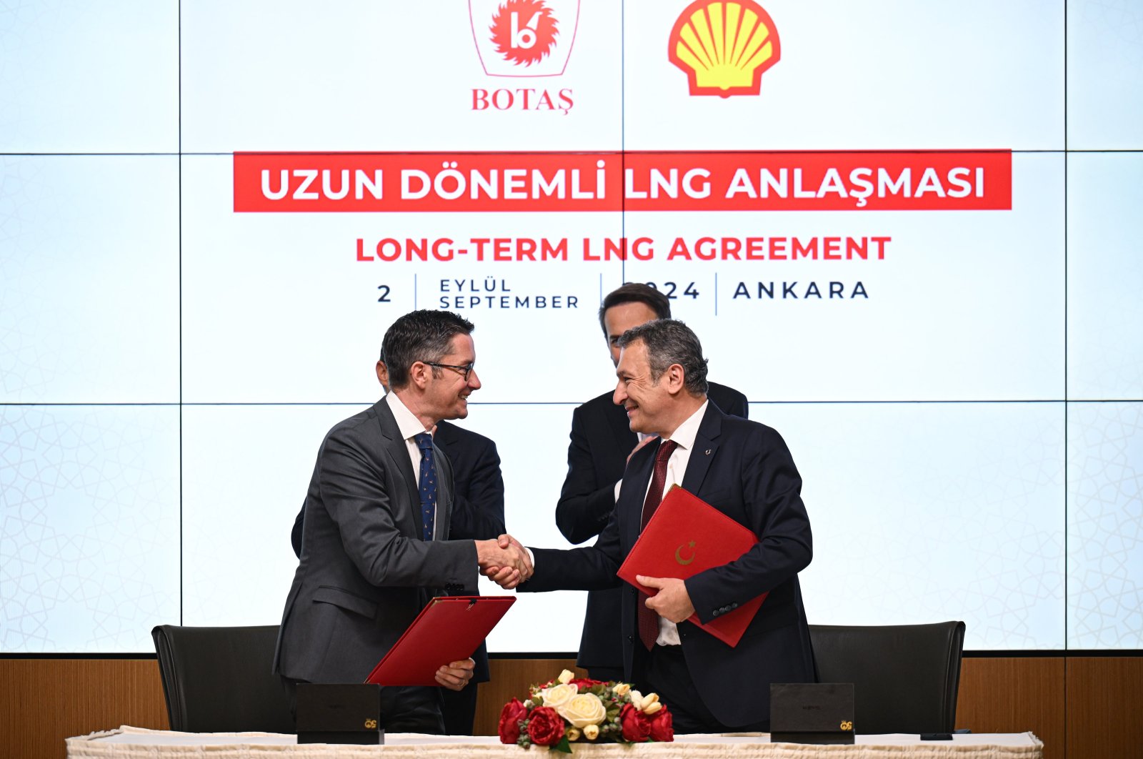 Energy and Natural Resources Minister Alparslan Bayraktar and TotalEnergies and BOTAŞ' officials attend the signing ceremony for the agreement, Houston, U.S., Sept. 18, 2024. (AA Photo)