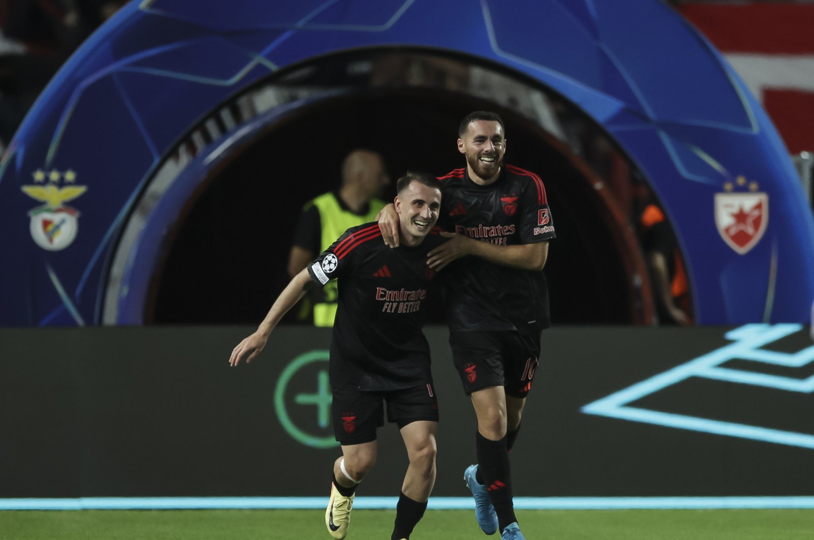 Benfica's Orkun Kökçü (R) celebrates after scoring a goal with Kerem Aktürkoğlu during the UEFA Champions League 2024/25 League Phase MD1 match against Red Star Belgrade at Stadion Rajko Mitic, Belgrade, Serbia, Sept. 19, 2024. (Getty Images Photo)