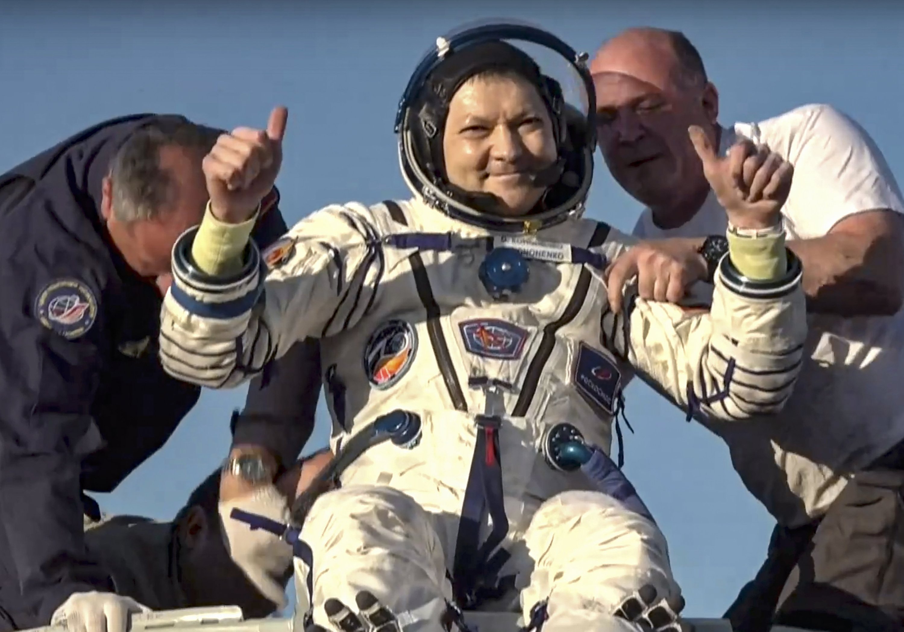 347283 Rescue team members helping Russian Cosmonaut Oleg Kononenko exit the Soyuz MS-25 space capsule shortly after landing southeast of the town of Zhezkazgan, Kazakhstan, Sept. 23, 2024. (EPA/Roscosmos Handout)