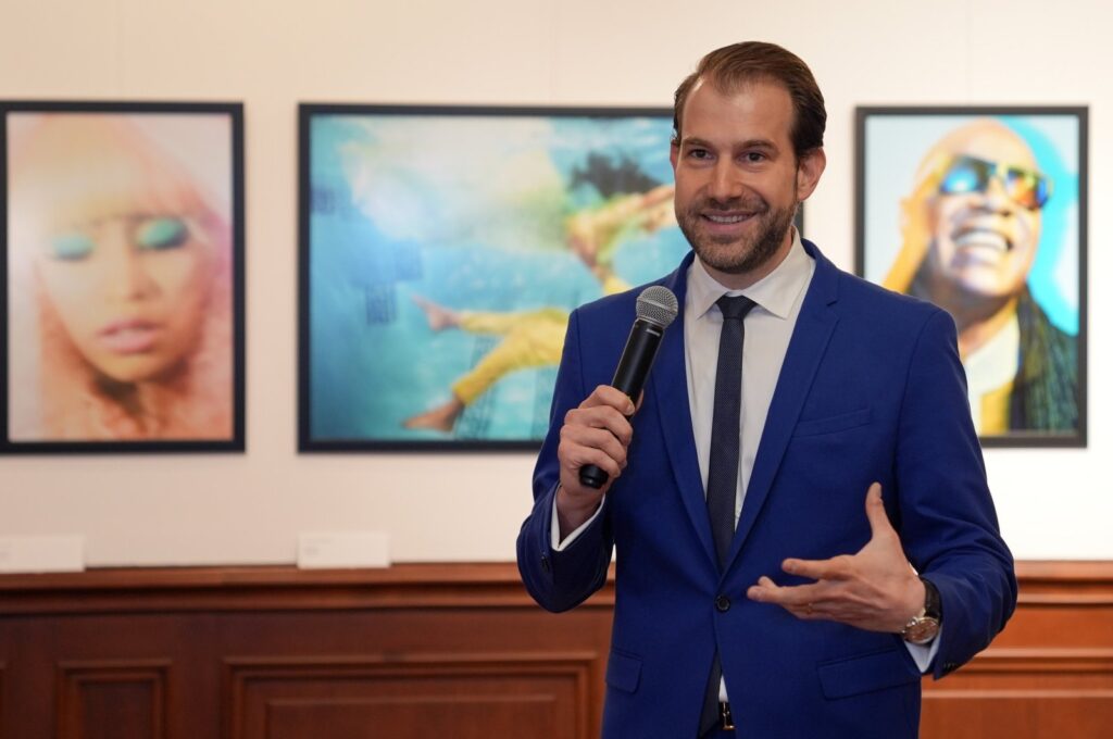 Photographer Pari Dukovic addresses journalists during the opening of his first solo exhibition in Türkiye, titled "From Istanbul to New York: A Photographer's Journey," Istanbul, Türkiye, Sept. 25, 2024. (AA Photo)