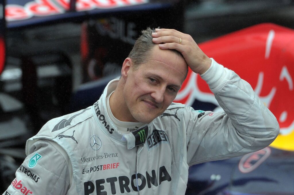 German Formula One driver Michael Schumacher gestures at the end of the Brazil's F1 GP at the Interlagos racetrack, Sao Paulo, Brazil, Nov. 25, 2012. (AFP Photo)