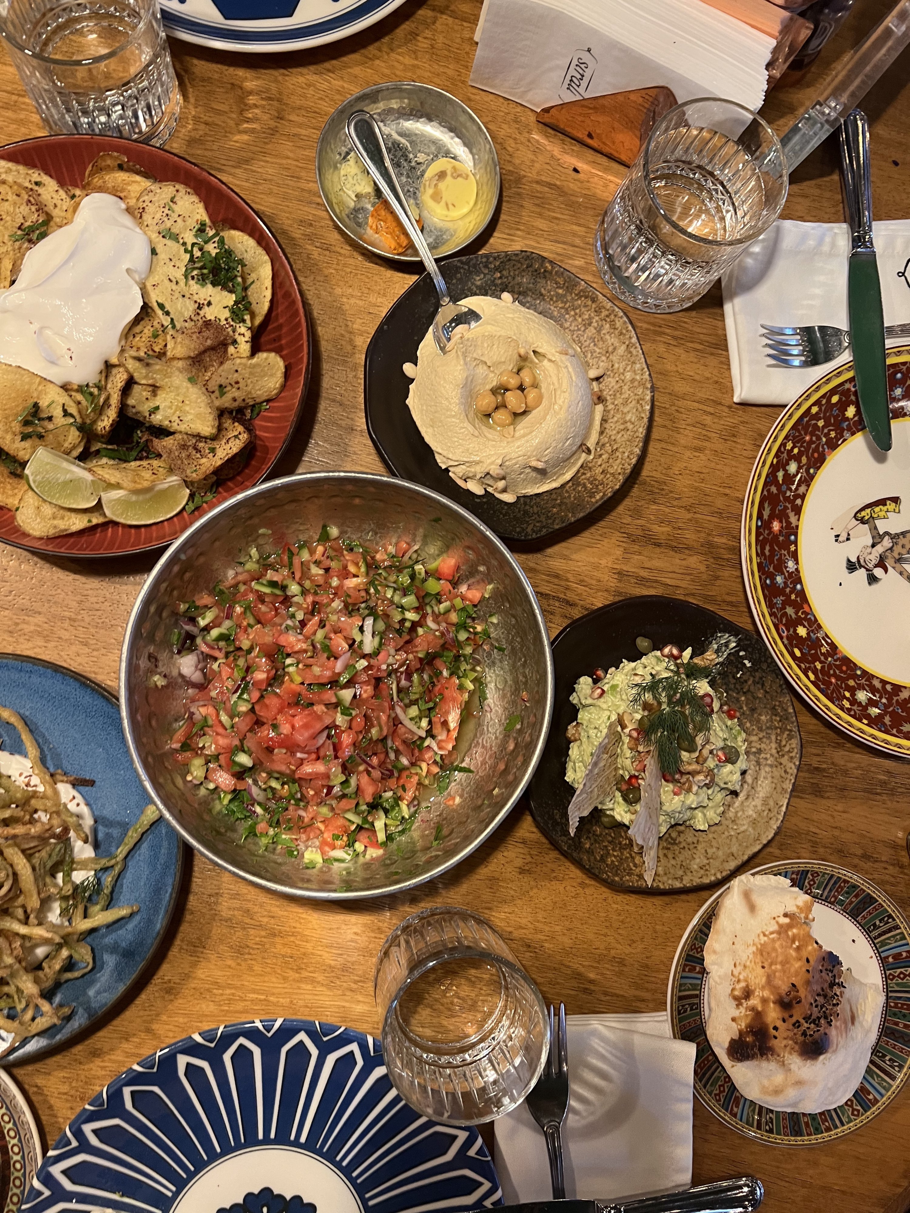 347930 The dining table at Sıralı Kebab is filled with Turkish and Middle Eastern specialties, Ankara, Türkiye, Sept. 14, 2024. (Photo by İlker Topdemir)