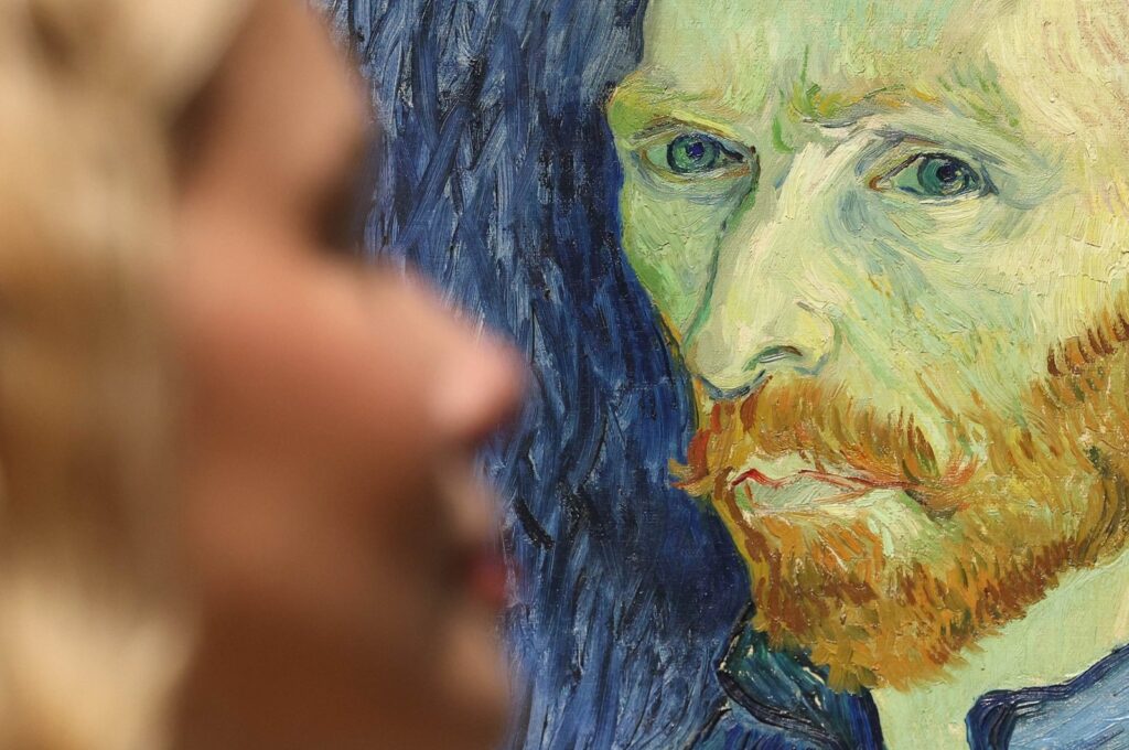 A gallery worker views Dutch painter Vincent Van Gogh's 1889 work "Self Portrait" during a preview for the exhibition "Van Gogh: Poets and Lovers" at the National Gallery, London, U.K., Sept. 9, 2024. (EPA Photo)