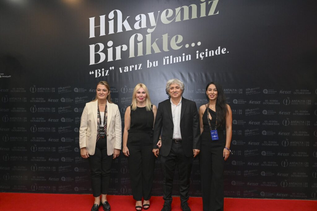 Professor Özlenen Özkan and Ömer Özkan attend the premiere of "Altın Eller" at the Atatürk Cultural Center, Antalya, Türkiye, Oct. 7, 2024. (IHA Photo)