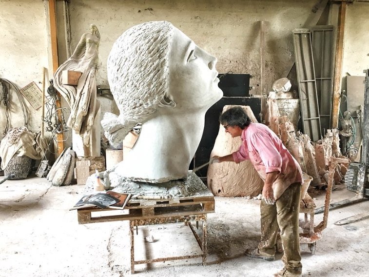 Italian sculptor Giacinto Bosco making his final touches to his artwork. (Courtesy of Giacinto Bosco)