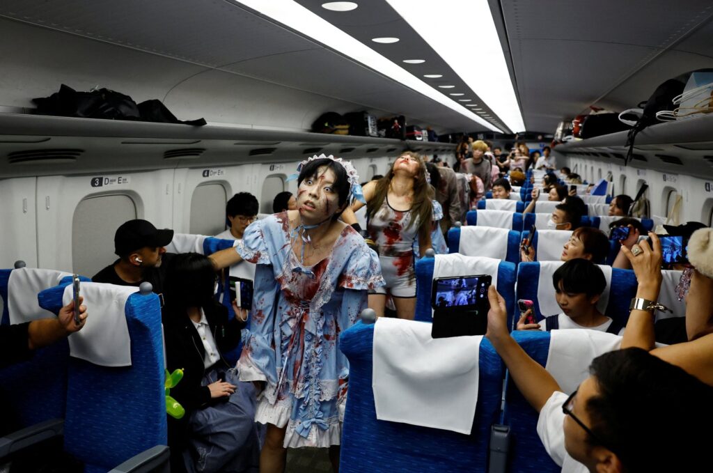 People dressed as zombies perform inside a "Zombie Shinkansen" bullet train bound for Osaka from Tokyo, inspired by the South Korean movie "Train to Busan," ahead of the Halloween season, Tokyo, Japan, Oct. 19, 2024. (Reuters Photo)