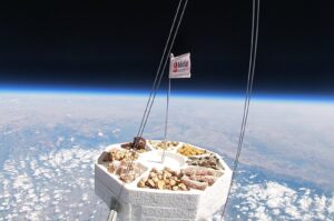 A capsule carrying nuts from Türkiye's Adana brand Bulutlar Kuruyemiş reaches space, Oct. 23, 2024. (DHA Photo)
