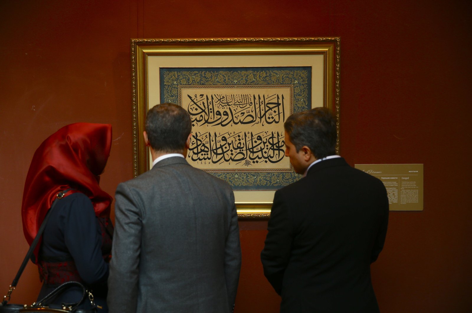 Visitors examine the artworks at the "Heritage Beyond Time: The Silk Road" exhibition in Baku, Azerbaijan, Oct. 22, 2024. (AA Photo)