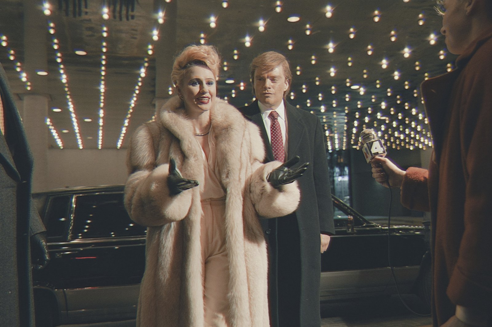 This image released by Briarcliff Entertainment shows Maria Bakalova, left, and Sebastian Stan in a scene from the film "The Apprentice." (AP Photo)