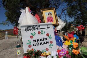 Narin's grave adorned with her photo and flowers, Diyarbakır, Türkiye, Oct. 11, 2024. (IHA Photo)