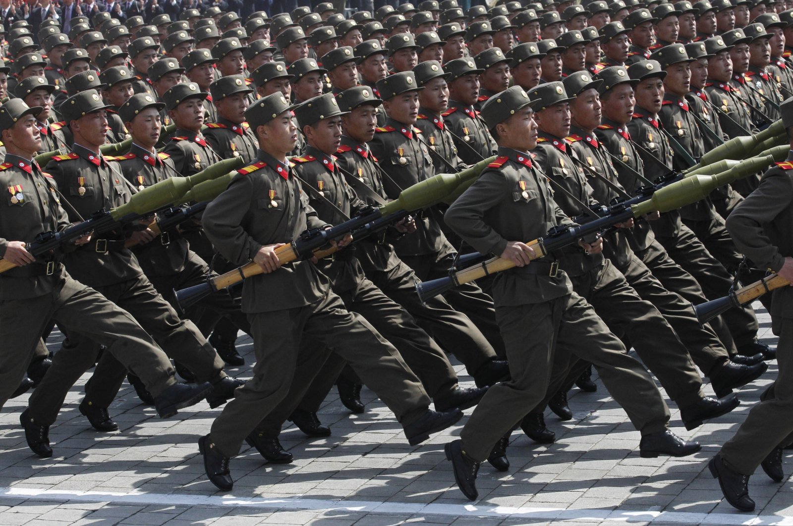 North Korean soldiers march during a mass military parade to celebrate 100 years since the birth of North Korean founder, Kim Il Sung, in Pyongyang's Kim Il Sung Square, North Korea, April 15, 2012. (AP File Photo)