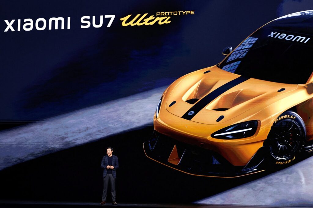 Xiaomi founder and CEO Lei Jun unveils Xiaomi's new EV sedan SU7 Ultra during an event, Beijing, China, Oct. 29, 2024. (Reuters Photo)