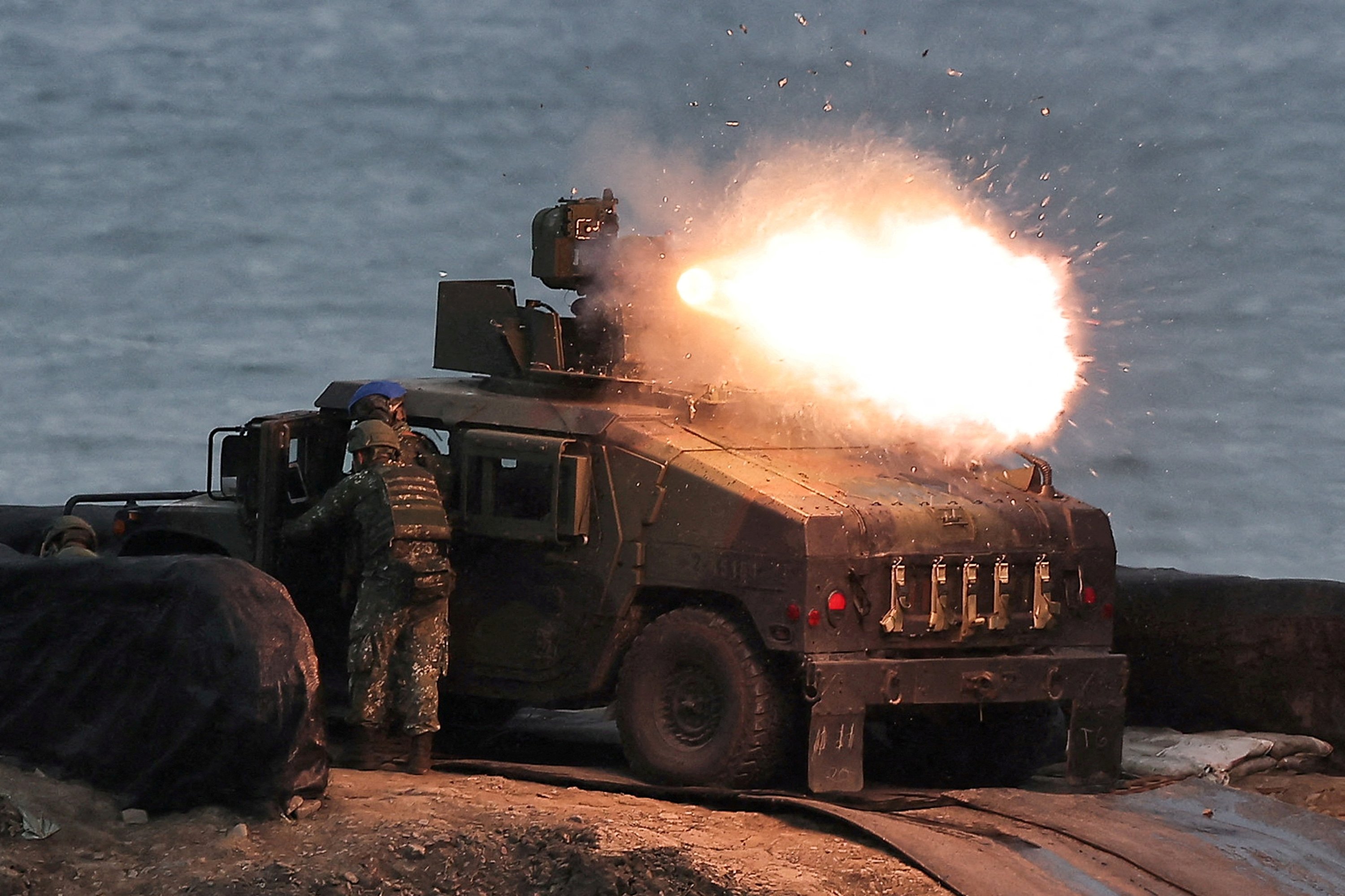 357550 A U.S.-made TOW-2A wire-guided anti-tank missile launched by Taiwanese soldiers from a M1167 TOW carrier vehicle at the Fangshan training grounds in Pingtung, Taiwan, Aug. 26, 2024. (Reuters Photo)