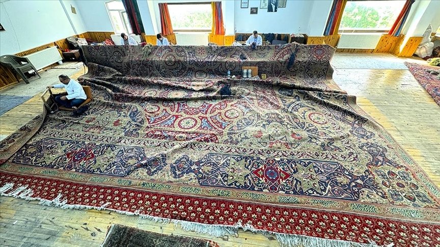 The Ottoman-era carpet to be sent to the Peace Palace in The Hague is restored in Aksaray, central Türkiye, Aug. 5, 2024. (AA Photo)