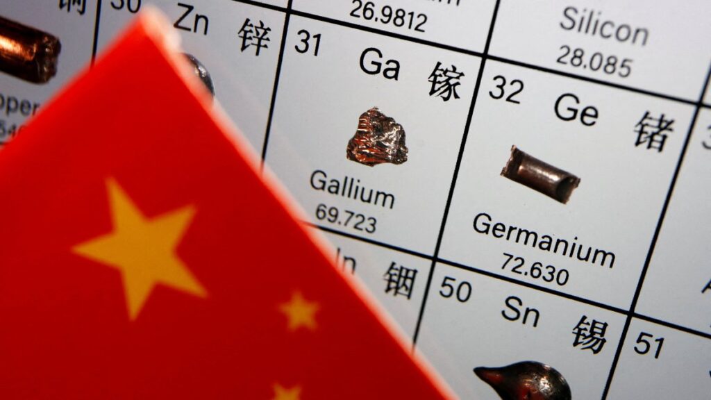 The flag of China is placed next to the elements of gallium and germanium on a periodic table, in this illustration picture taken on July 6, 2023. (Reuters Photo)
