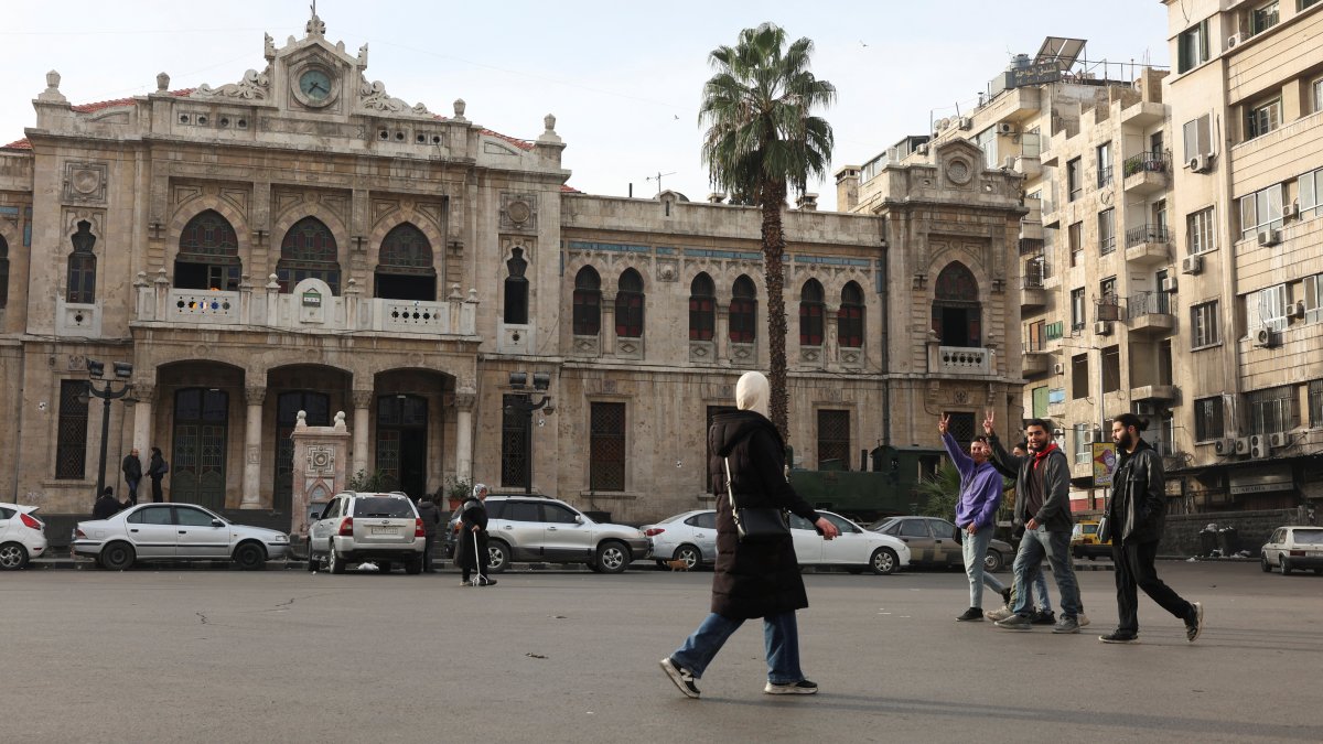 People walk along a street, after opposition forces seized the capital and ousted Syria's Bashar Assad, Damascus, Syria, Dec. 11, 2024. (Reuters Photo)